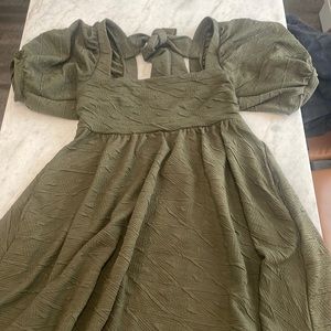 Olive green baby doll dress with tie in the back